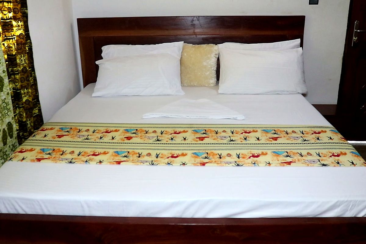 Chambre confortable de l'Espace MABIN